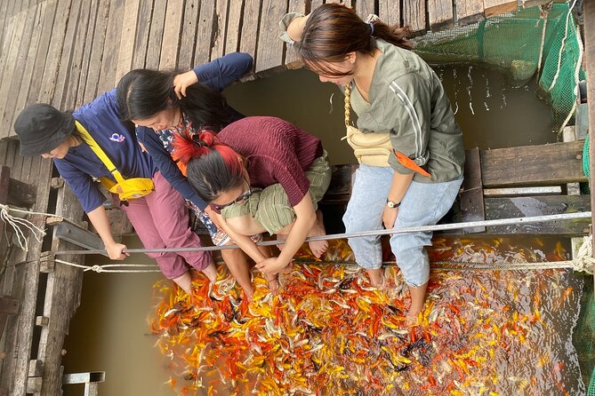 Can Tho day tour: fruit garden&floating fish farm in Son islet - Your guide matters: Thi and Edward are a strong sign