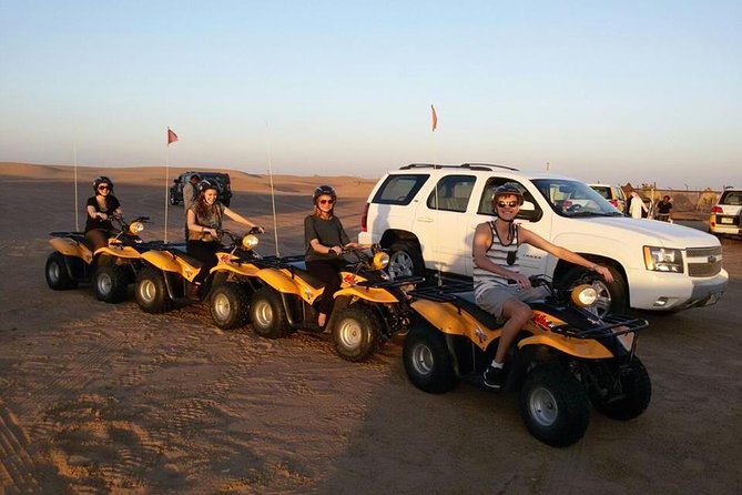 Dubai Desert Morning Tour in 4WD Vehicle: Camel Ride, Quad Bike Tour, Sandboarding, and Camel Farm - Sandboarding Down the Dunes: The Moment You’ll Laugh a Lot