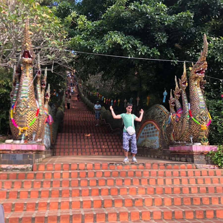 From Chiang Mai: Temples, Sticky Waterfall, and Orchid Farm - Doi Suthep and the Golden Pagoda: views plus a real relic story