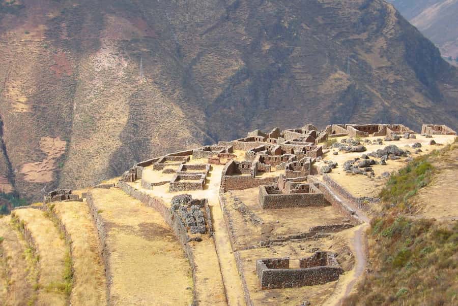 From Cusco: Private Pisac Ruins and Alpaca Farm Day Trip - Alpaca Farm Stop: Feeding Llamas, Petting Alpacas, and Weaving Knowledge