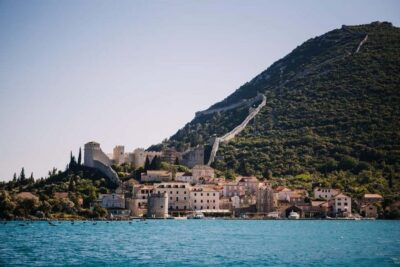From Dubrovnik: Mali Ston Oysters Farm & Boat Experience - Boarding a traditional boat in Ston Bay