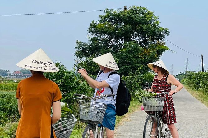 Hue Organic Farm Visit and Traditional Cooking Class - Madam Thu Farm at La Chu Village: Harvesting, Watering, and Crop Stories