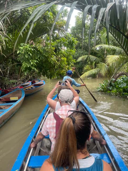 Mekong Delta Day Trip: Explore Cycling & Cook Classes Farm - Hand-Rowed Sampan and Canal Life: Up Close, Slower, Smaller