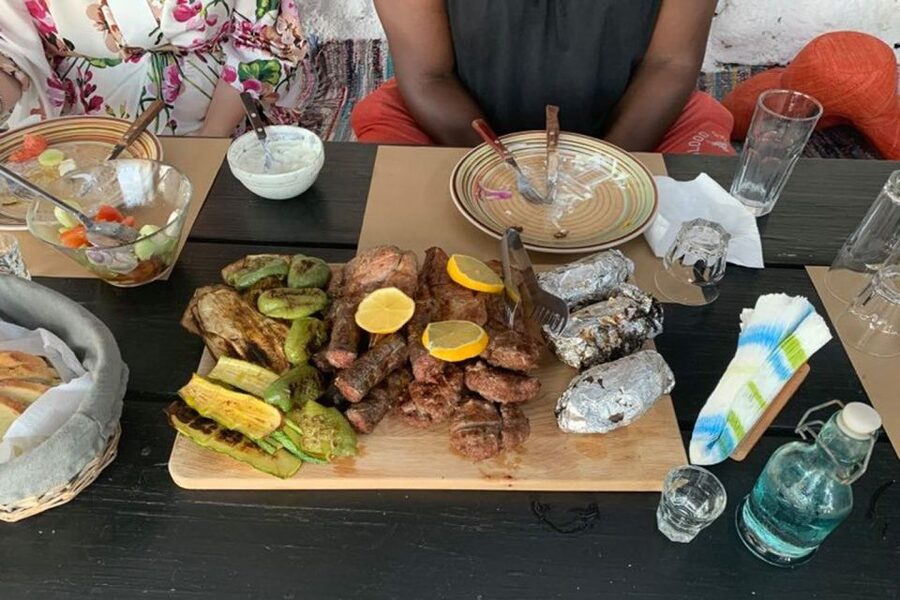 Mykonos: Barbecue at a Mykonian Farm - Eating Under a Pavilion: Wine, Unlimited Drinks, and a Real Group Dinner
