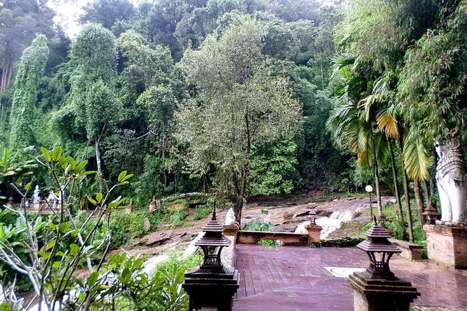 One Day Tour Doi Suthep Temple, Palad Temple, Orchid Farm, Longneck hill tribe village (Private tour) - Palad Temple Grounds: Scenic Stops Built Into the Day