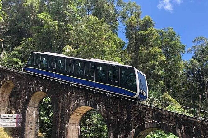 Penang Full Day Tour with Penang Hill, Kek Lok Si & Fruit Farm - Kek Lok Si Temple: Seeing One Complex Through Multiple Traditions