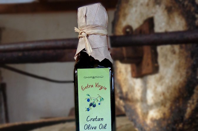 Traditional Olive Oil Making at Spiridi Olive Oil Farm - Crete - Pressing with a manual wooden press: the craft moment