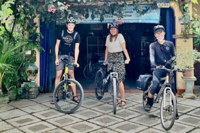 Yogyakarta Cycling Tour Around the Villages and Fish Farm - Entering at Izzati Jogjatour: bikes, helmets, and a quick warm-up